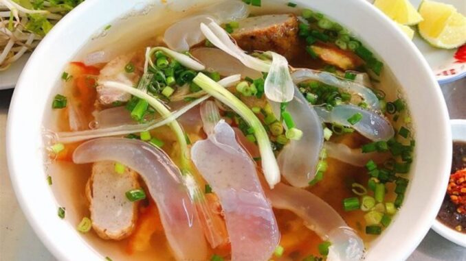 A bowl of jellyfish noodle soup